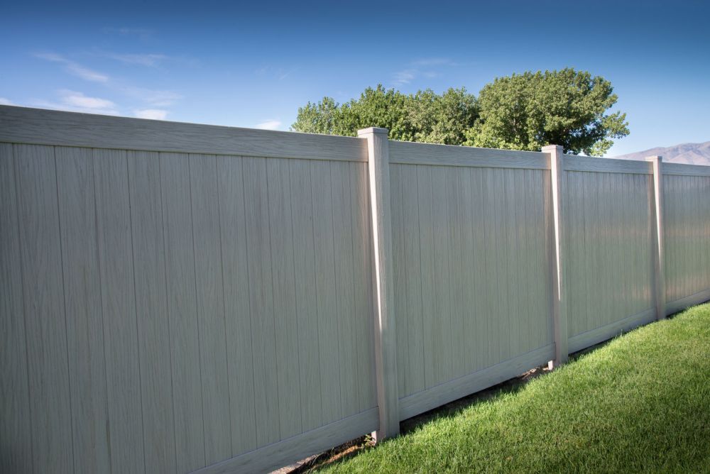 Vinyl fence installation on Rigby, Idaho acreage