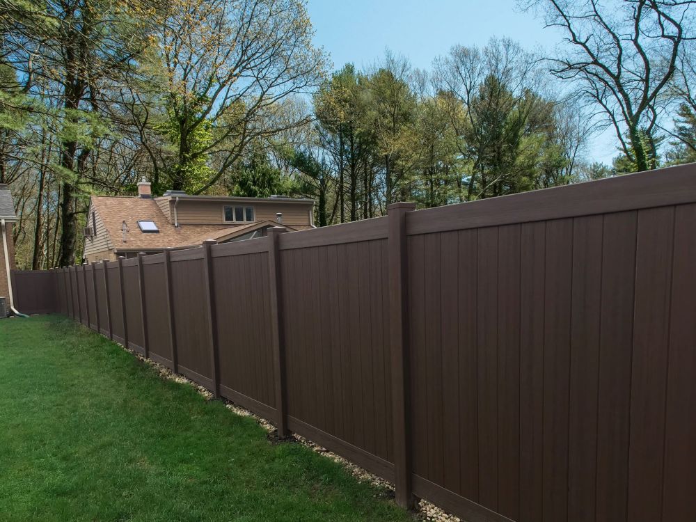 Two-tone vinyl privacy fence in Eastern Idaho