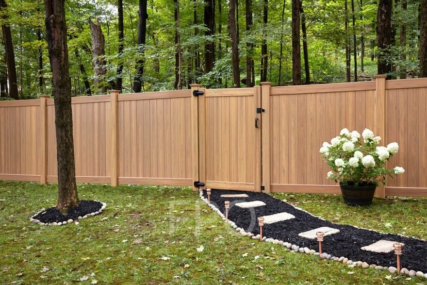 Residential vinyl fence install in a Rexburg neighborhood